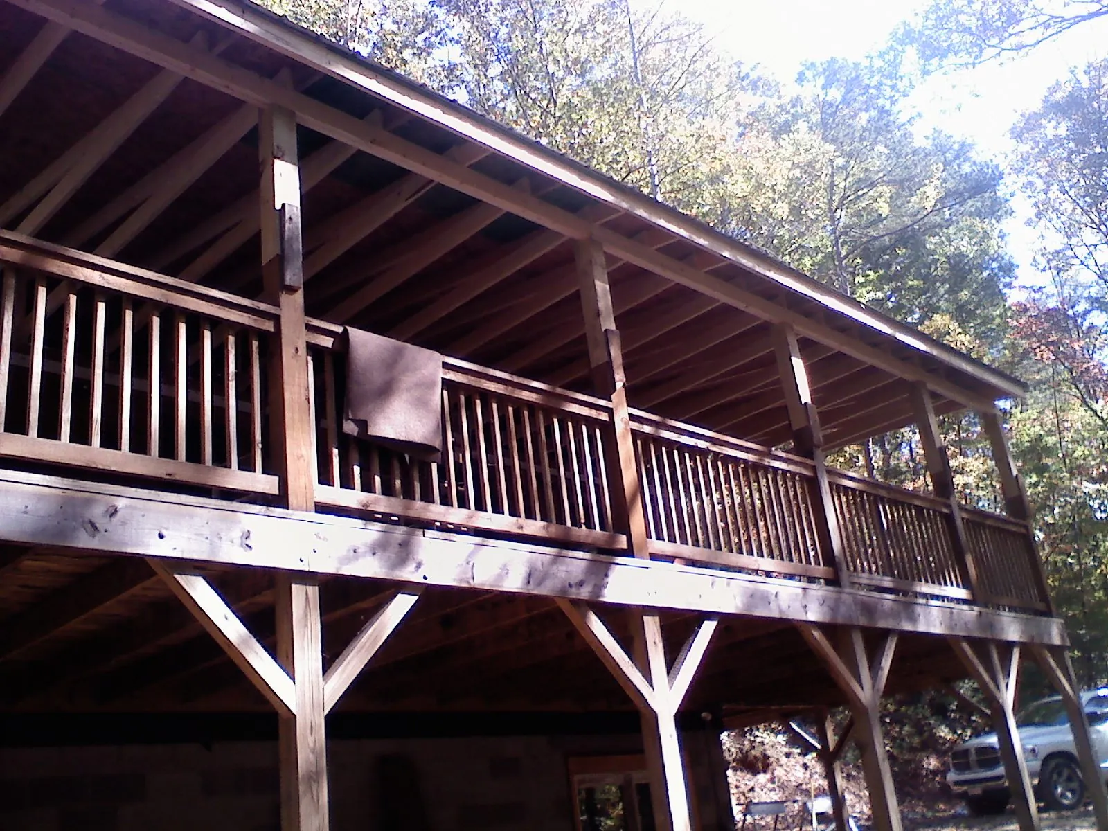 Timber framing under a new elevated porch and deck — Roof Leak Repair in Pemberville by Roofing Brothers